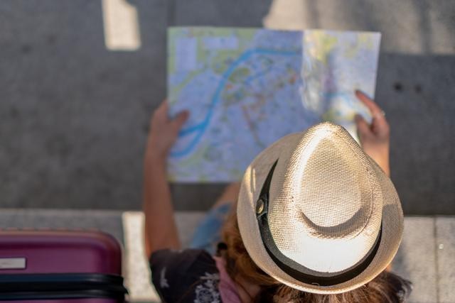 Decorative image - traveler with map
